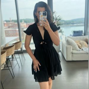 Black flowy dress with bow tie bust